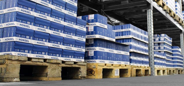 Ready for delivery: Full warehouse with packaging on pallets.